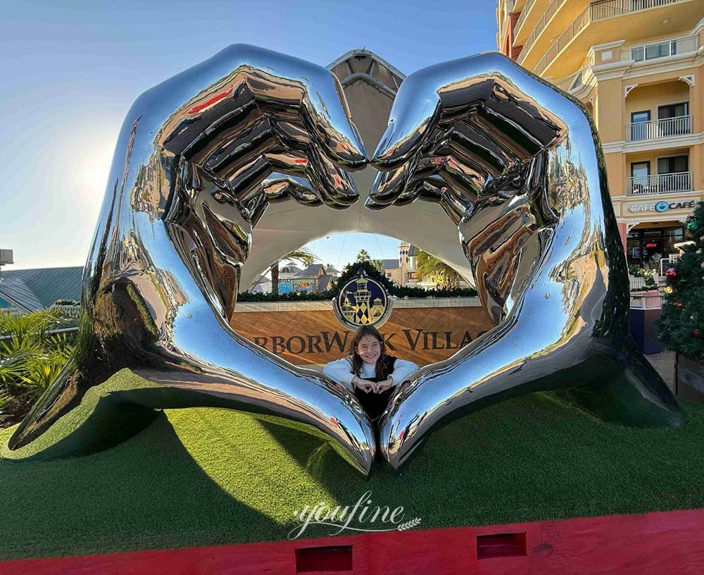 American stainless steel heart hand sculpture feedback