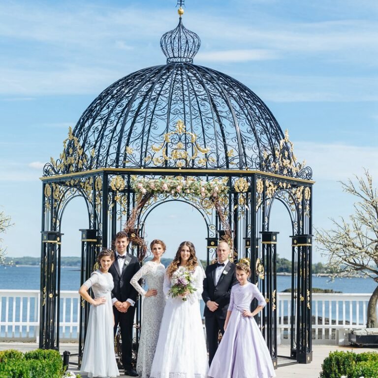 Large Black Round Metal Gazebo with Flowers for Seaside Wedding