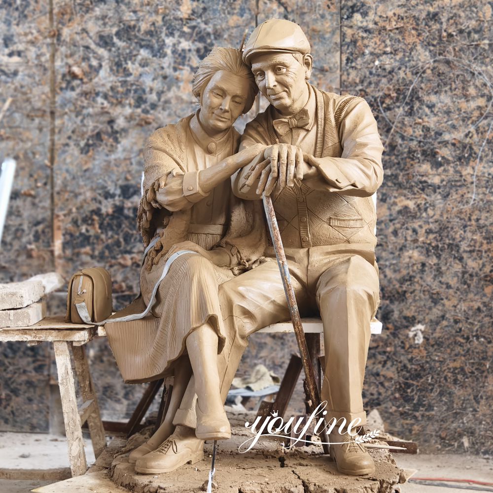 Bronze Sculpture of an Elderly Couple Sitting on a Bench Clay Model