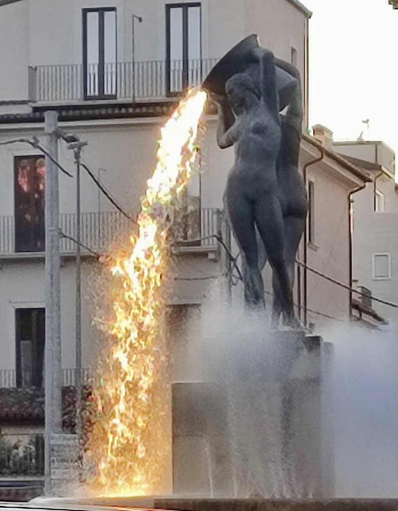 Bronze Statue Fontana Luminosa Fountain at Sunlight