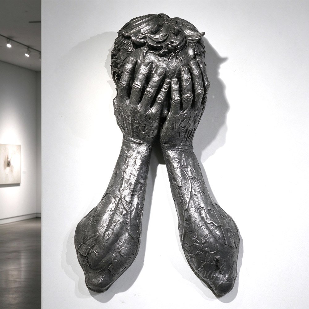 Grey Bronze Man Covering His Face with His Hands Wall Sculpture