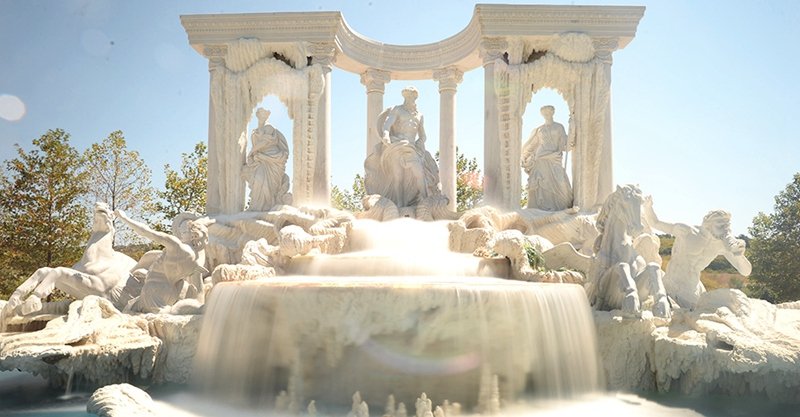 Large marble Trevi fountain in European manor