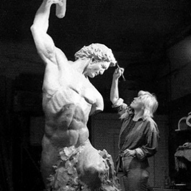Man Carving Himself Out of Stone (1)