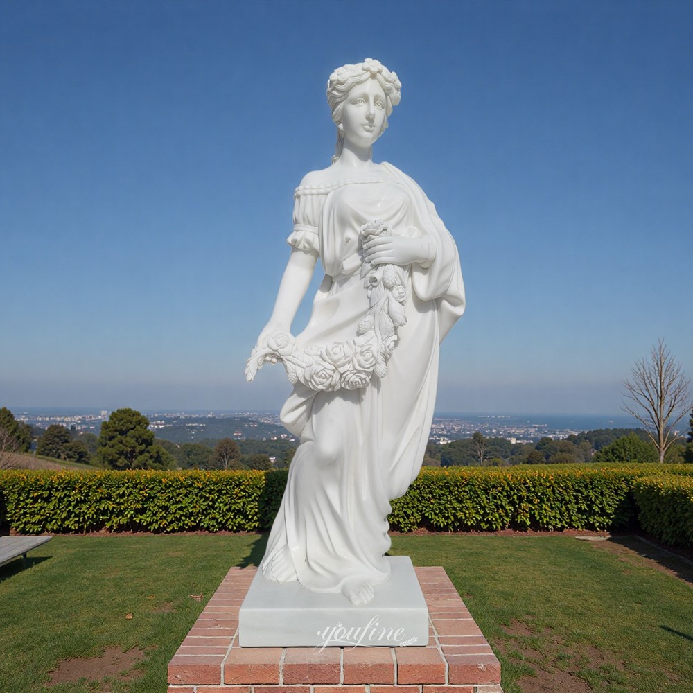 Marble Sculpture of a Woman Holding Flowers