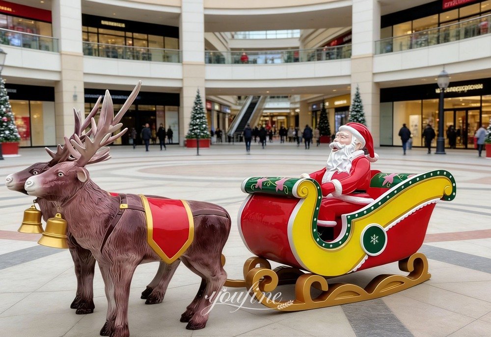 Resin sculpture of reindeer pulling a sleigh for shopping malls