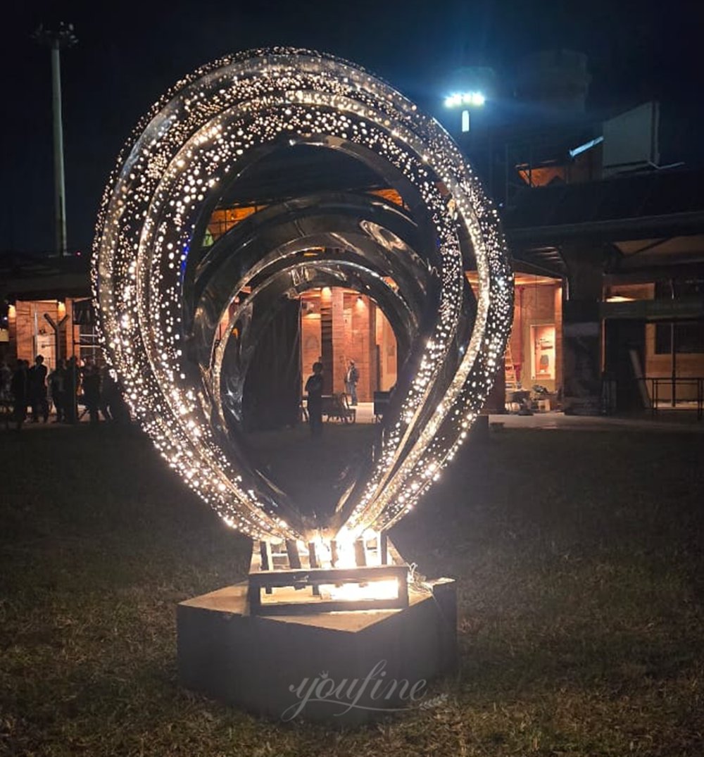 Stainless Steel Sculpture with Illuminated Base
