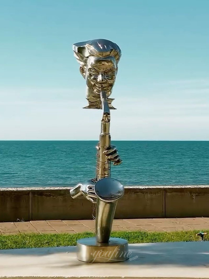 Stainless steel sculpture of a figure playing the saxophone