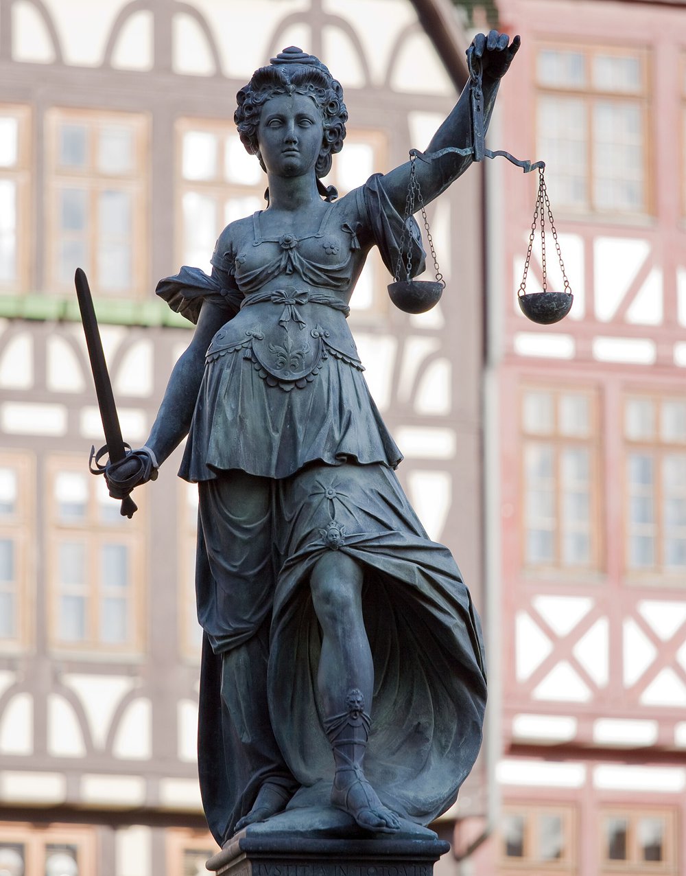The bronze Themis statue on the Fountain of Justice in Frankfurt, Germany