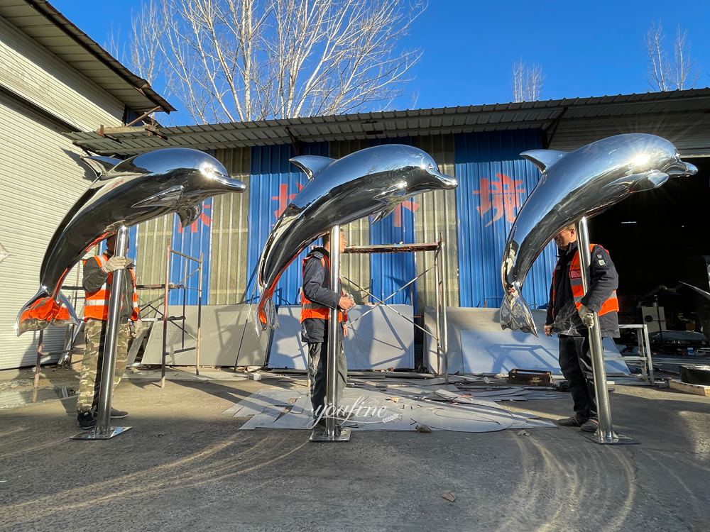 Three Large Mirror Polished Dolphin Statues