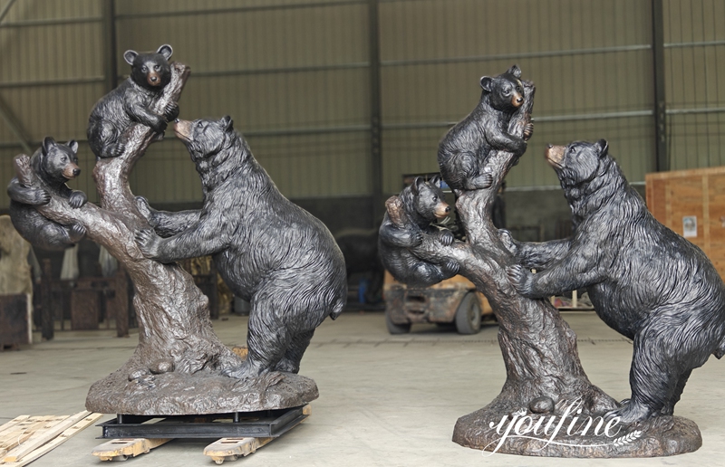 Two Finished Bronze Bear Climbing Tree Statues