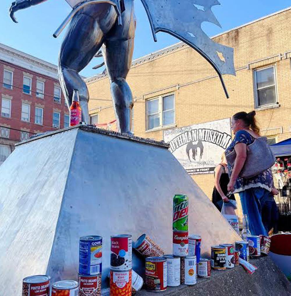 beans cans around the Mothman statue