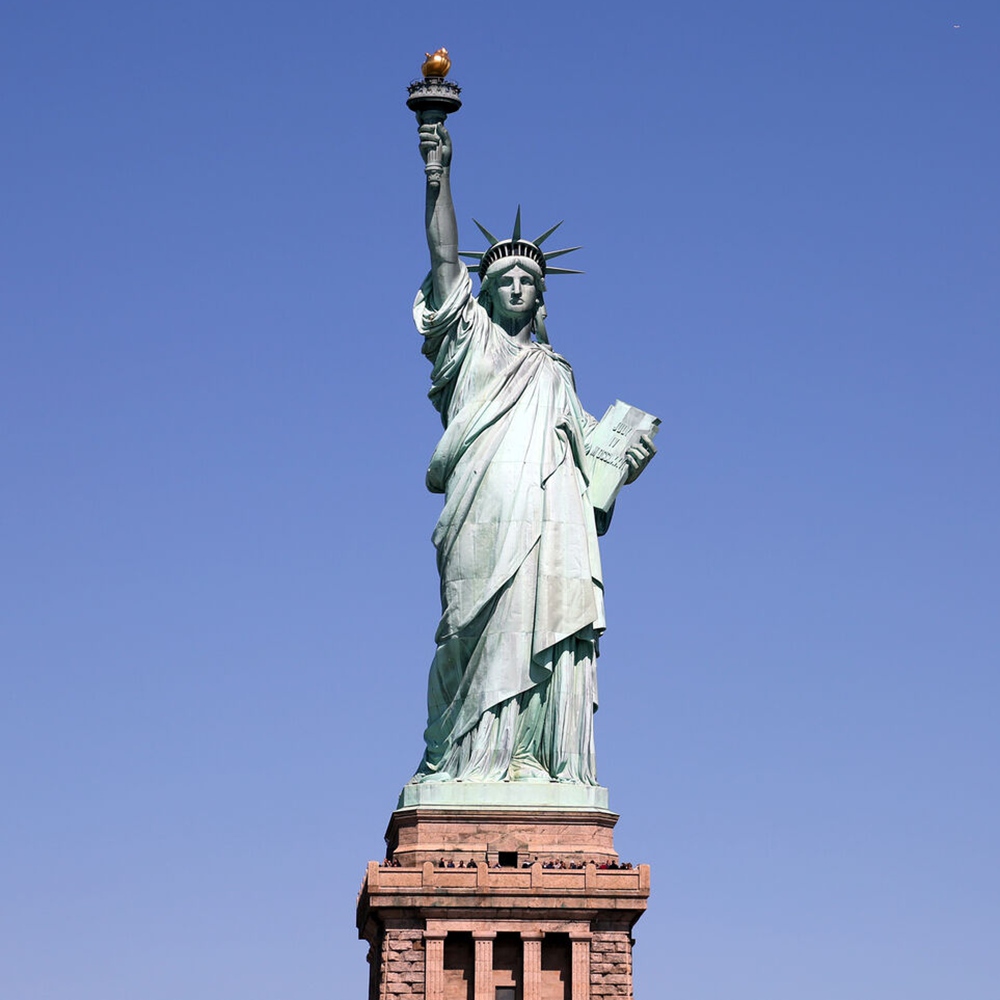 bronze Liberty statue with natural green patina