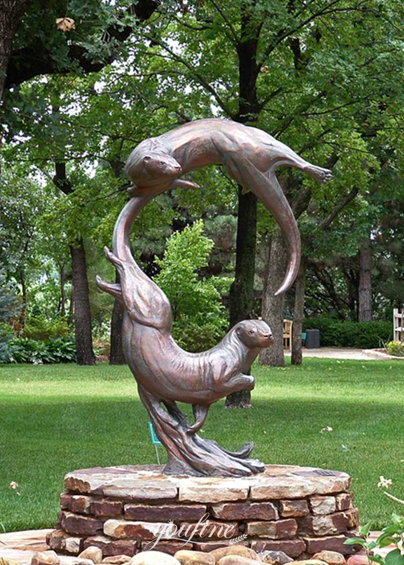 bronze otter sculpture