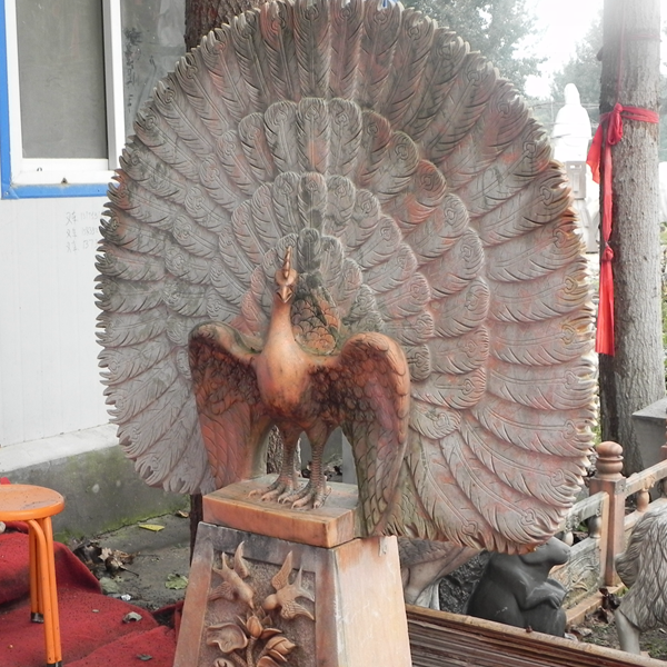 large peacock statue