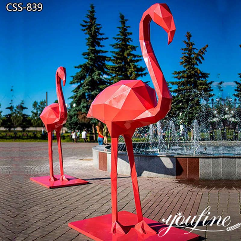 large metal flamingo sculpture