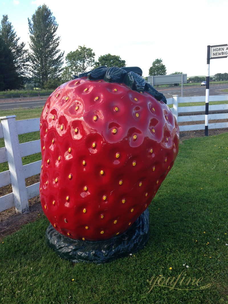 large strawberry sculpture