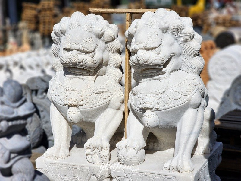 lion statues in front of house