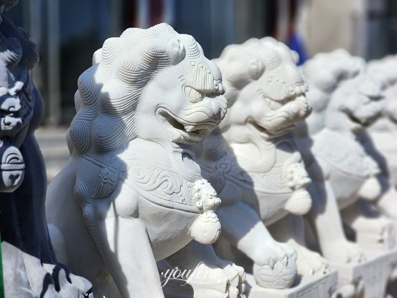 lion statues in front of house