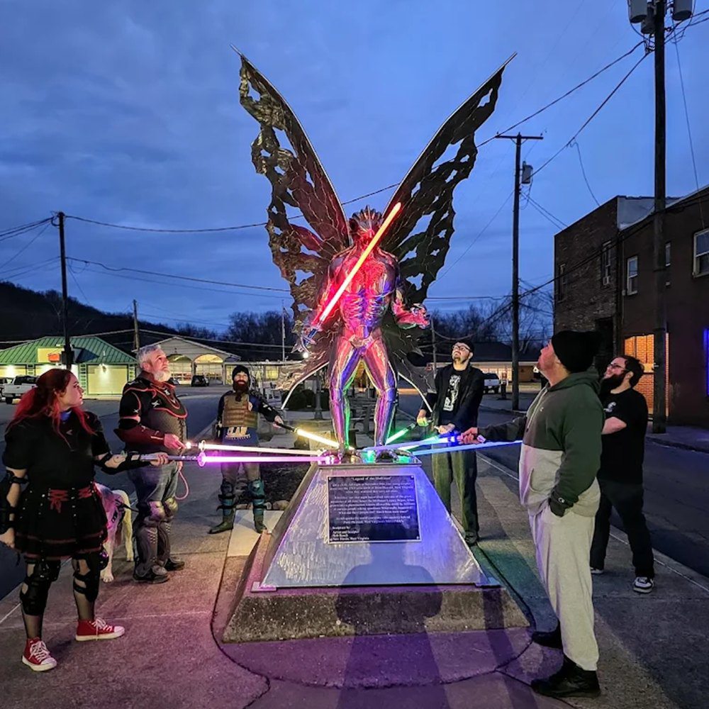 many funny people around the Mothman statue