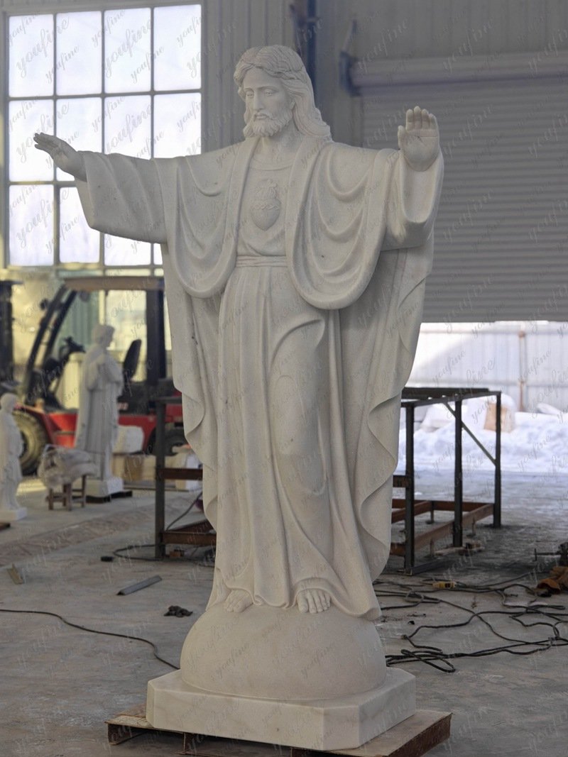 marble open arms jesus statue