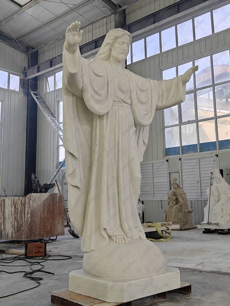 marble open arms jesus statue