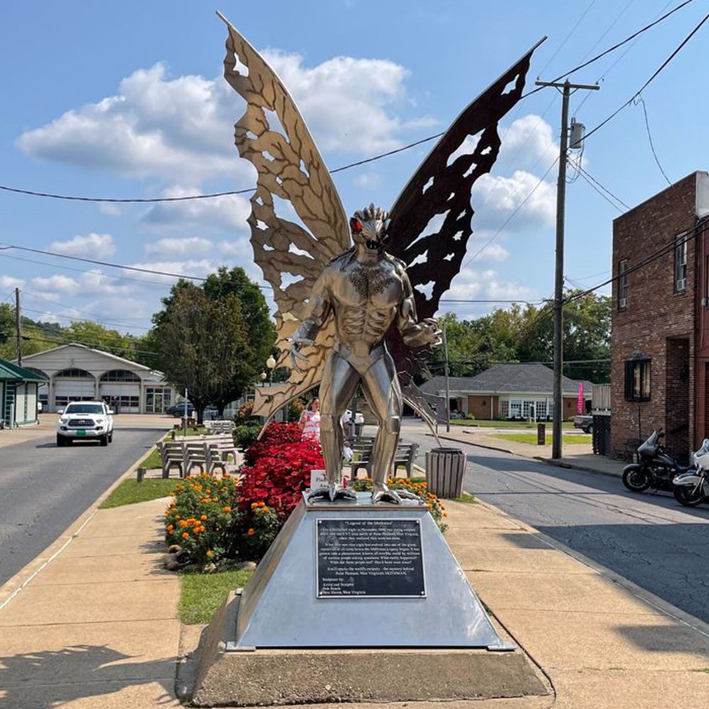 different sides of the Mothman statue