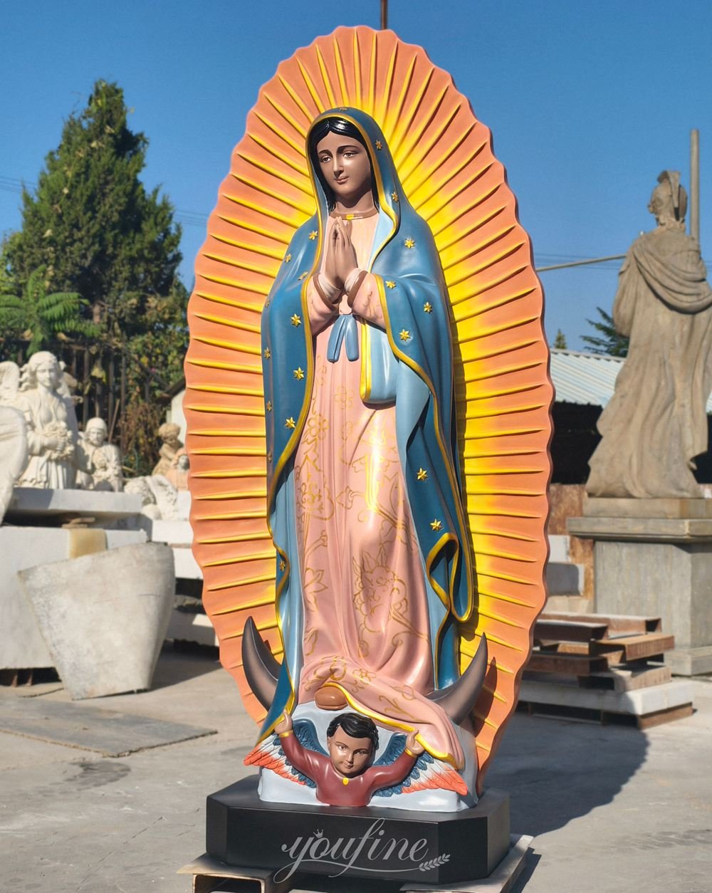 painted marble sculpture of Our Lady of Guadalupe