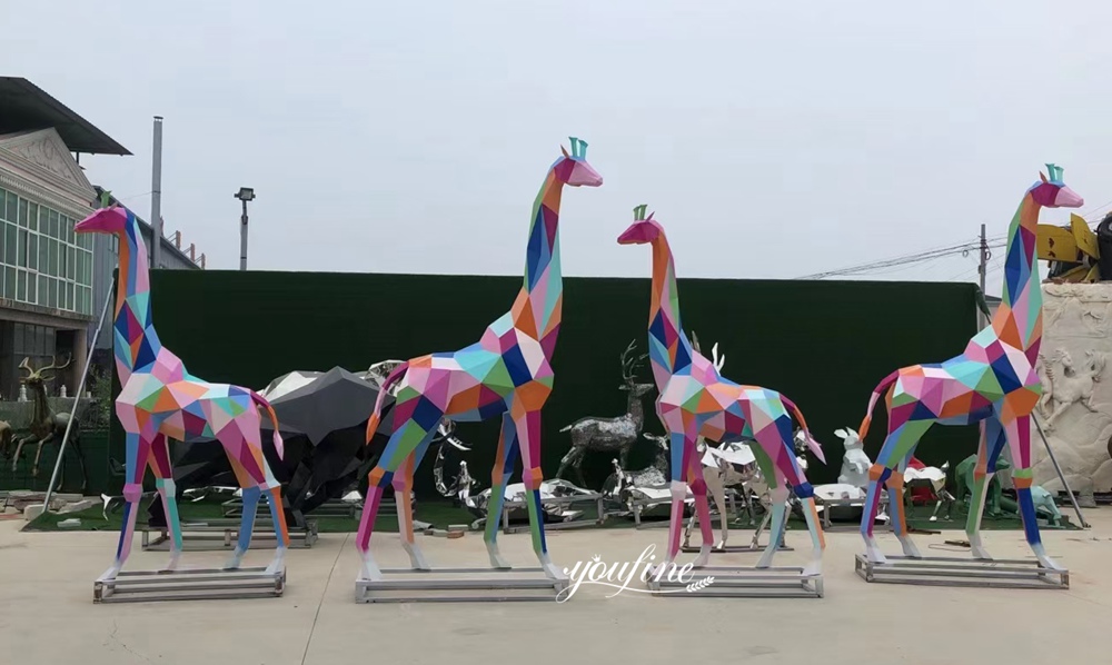 pink geometric giraffe sculptures