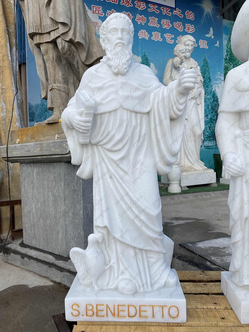 small marble saint sculptures