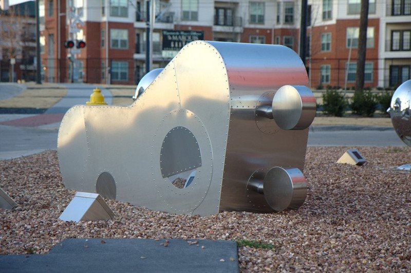 stainless steel the traveling man statue
